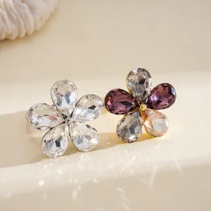 Exquisite flower-shaped ring featuring sparkling colorful crystals and adjustable gold band
