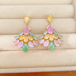 Detailed view of 14k gold plated fan-shaped earrings featuring colorful pear-cut zircon stones