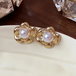 Elegant French retro 13k gold plated flower stud earrings with central white pearls