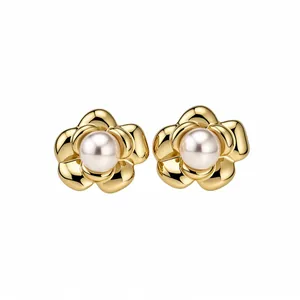 Vintage flower pearl stud earrings with 13k gold plating and elegant pearl center