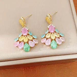 Detailed close-up view of elegant colorful teardrop zircon fan-shaped gold-plated drop earrings