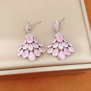 Detail shot of elegant pink teardrop cubic zirconia fan-shaped earrings with silver finish
