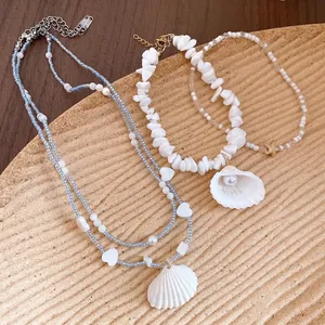Summer beach style shell beaded necklace with blue and white layered design