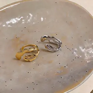 Élégantes boucles d'oreilles en forme de plume en or et argent sans perçage, chic