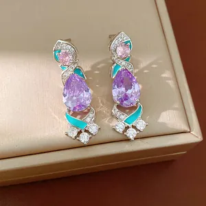 Vintage court style purple pear-shaped zirconia earrings with turquoise enamel