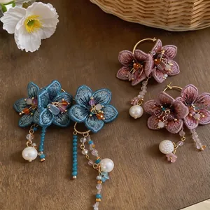 Elegant handmade knitted flower drop earrings with pearls and glass beads for vacation