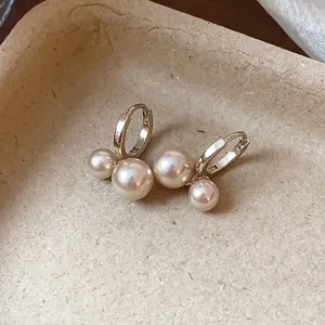 Elegant French retro gold hoop earrings featuring double white pearls for women jewelry