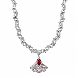 Luxury silver-toned necklace with oval red zircon and pink stone accents