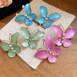 Elegant gradient enamel butterfly stud earrings with sparkling zirconia accents for women