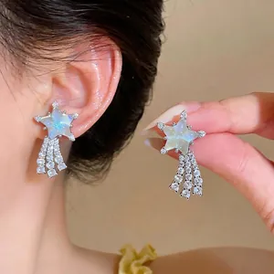 Sparkling star tassel earrings with shimmering zircons and shell inlay for women.