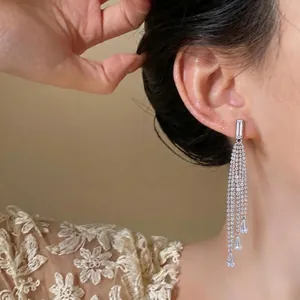 Elegant long zircon tassel drop earrings for women with full diamond shimmer design