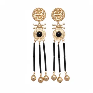 Vintage gold-tone drop earrings with embossed figure, Greek key and black tassels