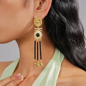 Vintage gold-plated portrait tassel earrings with black beads for an elegant style