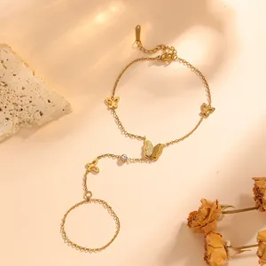 Detailed close-up of a gold-plated butterfly slave bracelet made of durable titanium steel
