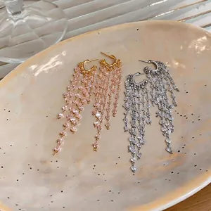 Exaggerated vintage crystal tassel drop earrings in gold and silver finishes for women