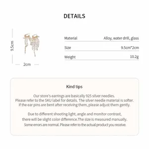 Detailed view of exaggerated rhinestone tassel earrings with size and material specifications