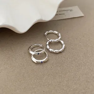 Elegant Korean style silver hoop earrings set with blue zircon and scalloped designs