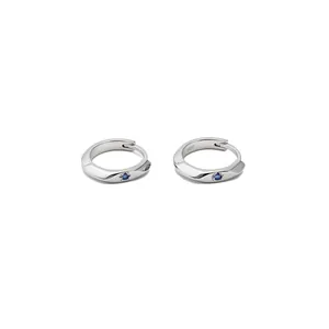 Korean style silver hoop earrings featuring a minimalist design with blue round zircon stones.