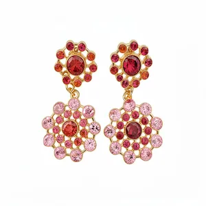Elegant vintage palace style hollow round drop earrings with pink and red rhinestones.