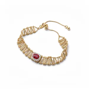 Elegant vintage gold hollow bracelet featuring an oval red zircon and adjustable bolo clasp