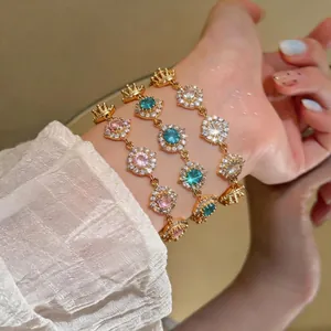 Elegante bracciale tondo placcato oro 18 carati con pietre di zircone multicolore