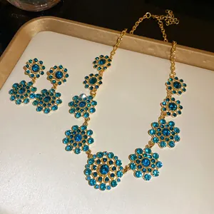 Vintage court style blue rhinestone hollow flower pendant necklace and earrings set