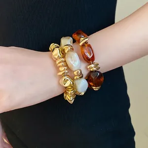 Pulseras elásticas vintage de acrílico geométrico irregular con detalles dorados