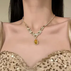 Elegant court style necklace featuring a stunning yellow teardrop zircon pendant