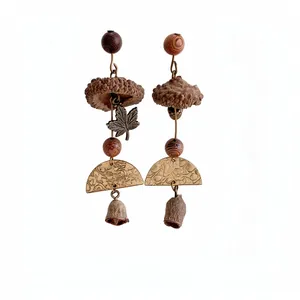 Vintage forest-style handmade acorn earrings with wooden beads and maple leaf charms.