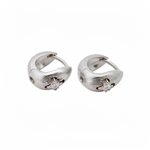 Minimalist silver-tone hoop earrings featuring star-set zircon and textured metal finish