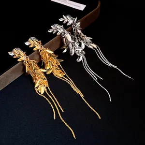 Detailed view of elegant zircon wheat ear tassel clip earrings in gold and silver finish