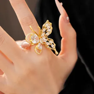 Close-up view of an exquisite gold-plated butterfly ring inlaid with sparkling cubic zirconia.