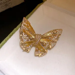 Luxurious 18k gold plated butterfly brooch with sparkling zircon inlays