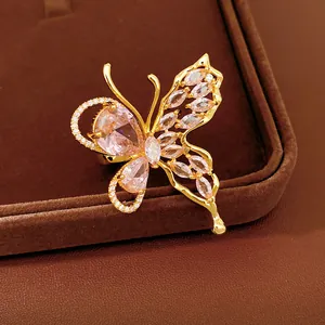 Detailed macro view of a gold-plated butterfly earring with exquisite zircon inlay.