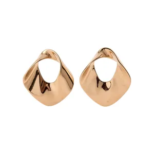 Elegant gold twisted geometric hollow metal stud earrings with high polish finish for women