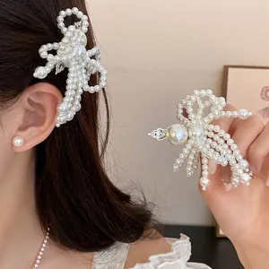 Elegant pearl bow hair clip with tassel design for women's hair accessories