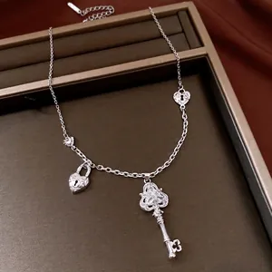 Elegant silver-toned zirconia key and heart lock adjustable pendant necklace for women