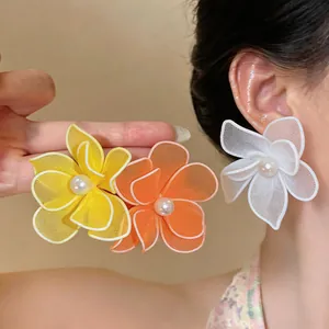 Elegant mesh floral earrings with pearls in yellow, orange, and white colors