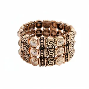 Vintage gold three-layer elastic bracelet featuring sparkling rhinestones and etched swirl patterns