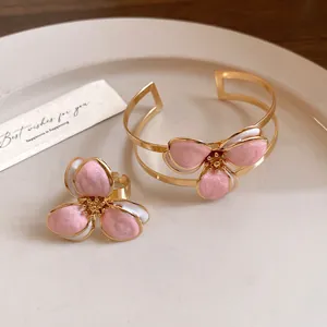 Elegant gold-plated vintage floral enamel cuff bracelet and open ring jewelry set with pink petals