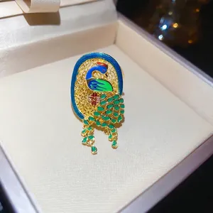 18K gold plated peacock open ring with colorful enamel and green dangles in box