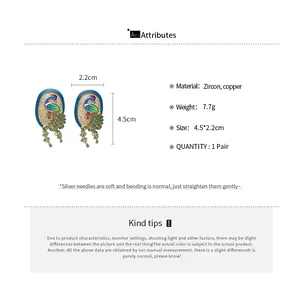 Peacock earrings with zircon and copper detailing product dimensions and weight