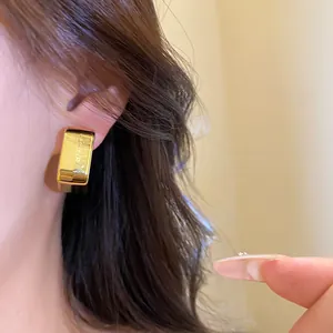Elegant vintage gold rectangular hoop earrings with a polished metallic finish for women