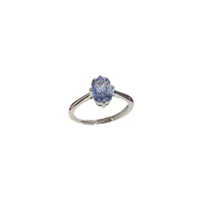 Elegant vintage silver ring featuring a radiant cut light blue gemstone, adjustable open band.