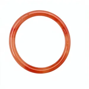 Elegant translucent red glass bangle bracelet featuring a smooth polished round bar