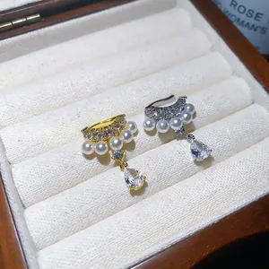 Elegant gold and silver zircon pearl teardrop ear cuffs for non-pierced ears.