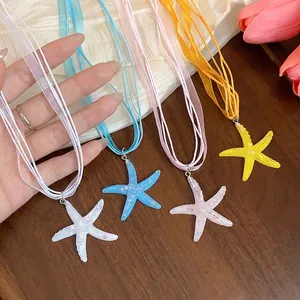 Resin starfish pendant necklaces with colorful ribbon cords for a vacation look