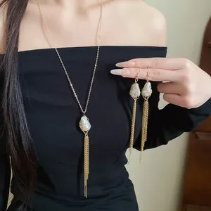 Vintage gold chain tassel earrings and necklace set with elegant pearl accents