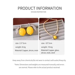 Detail view of lemon jewelry set specifications with earrings and necklace dimensions