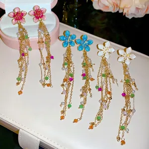 Floral tassel earrings with pearls in pink blue and white for a sweet summer look